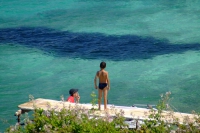 Child on beach in Ksamil